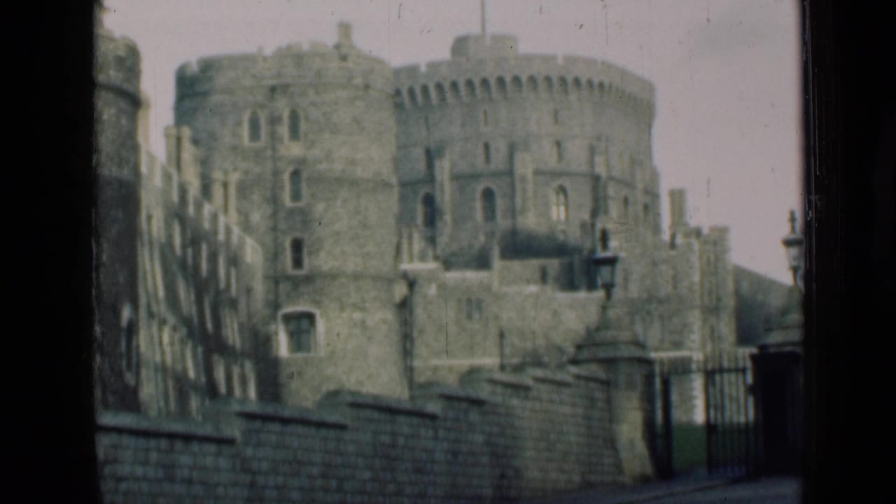 1946 8mm view of a round stone castle keep and battlements, seen from a visitor's exterior vantage in England.