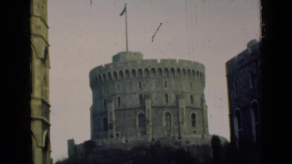 Visitor-shot 1946 8mm view of the Round Tower at Windsor Castle, with soft focus, faded color, and dark edges around the scene.