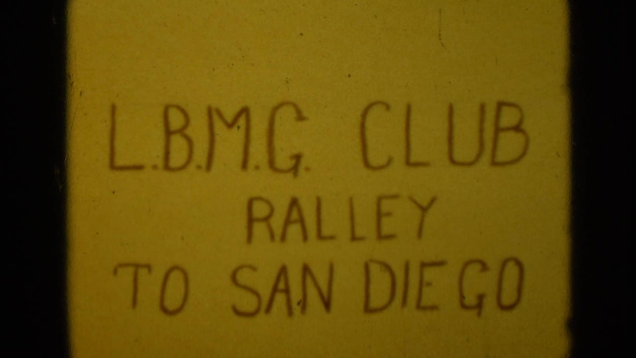 Handwritten card reading L.B.M.G. CLUB RALLEY TO SAN DIEGO.