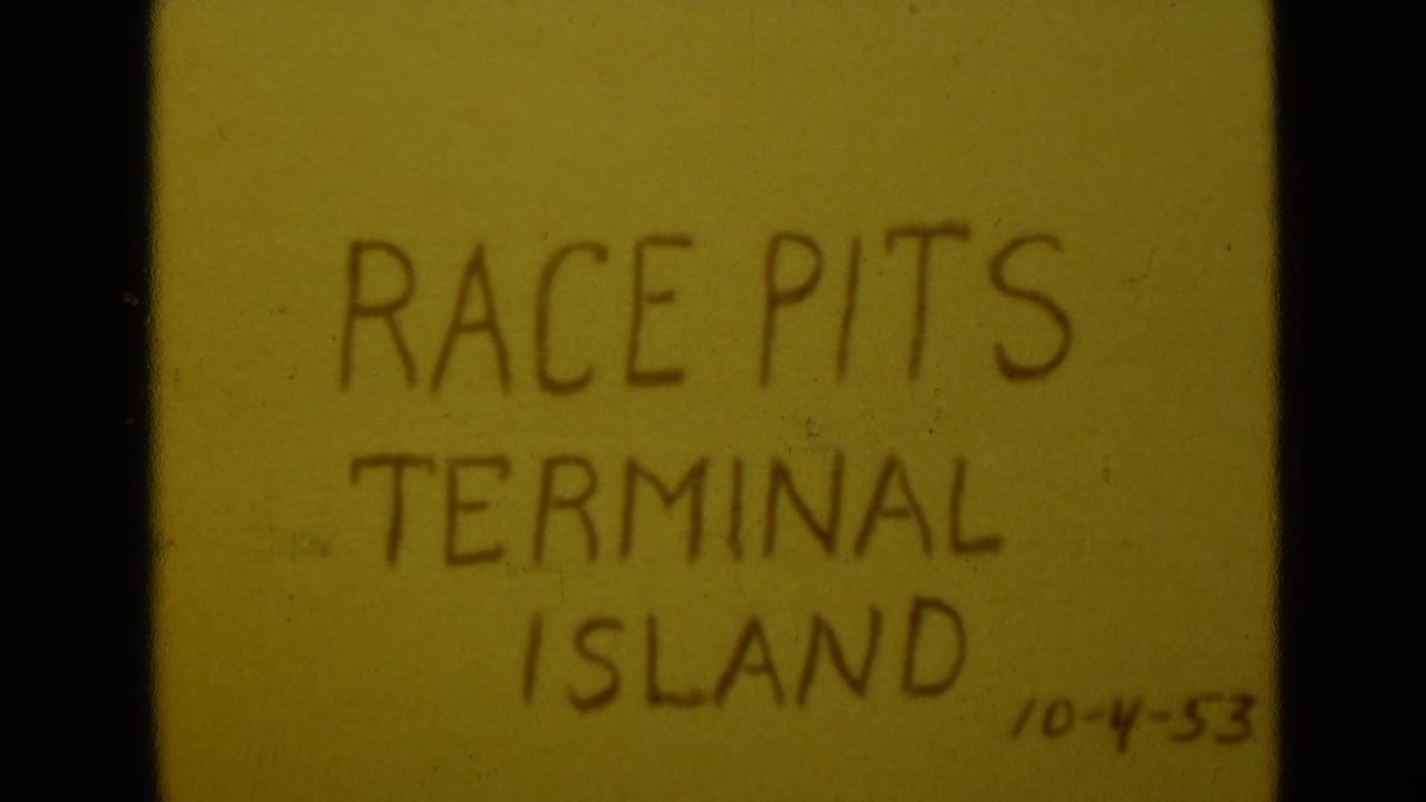 Close 8mm frame of the Race Pits Terminal Island title card, repeated with slight framing shift and visible film wear.