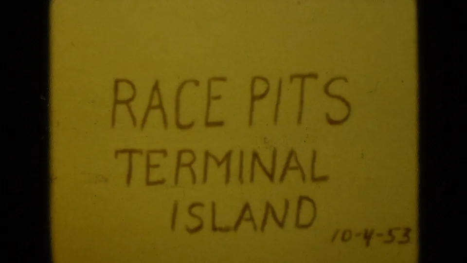 Close 8mm frame of the Race Pits Terminal Island title card, repeated with slight framing shift and visible film wear.
