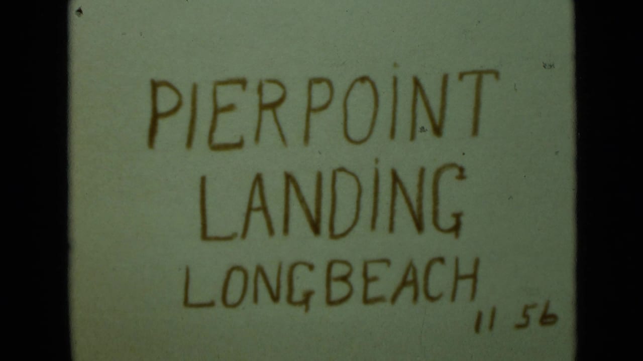 8mm title card for Pierpoint Landing, Long Beach, with handwritten lettering and a small 11 56 date notation.