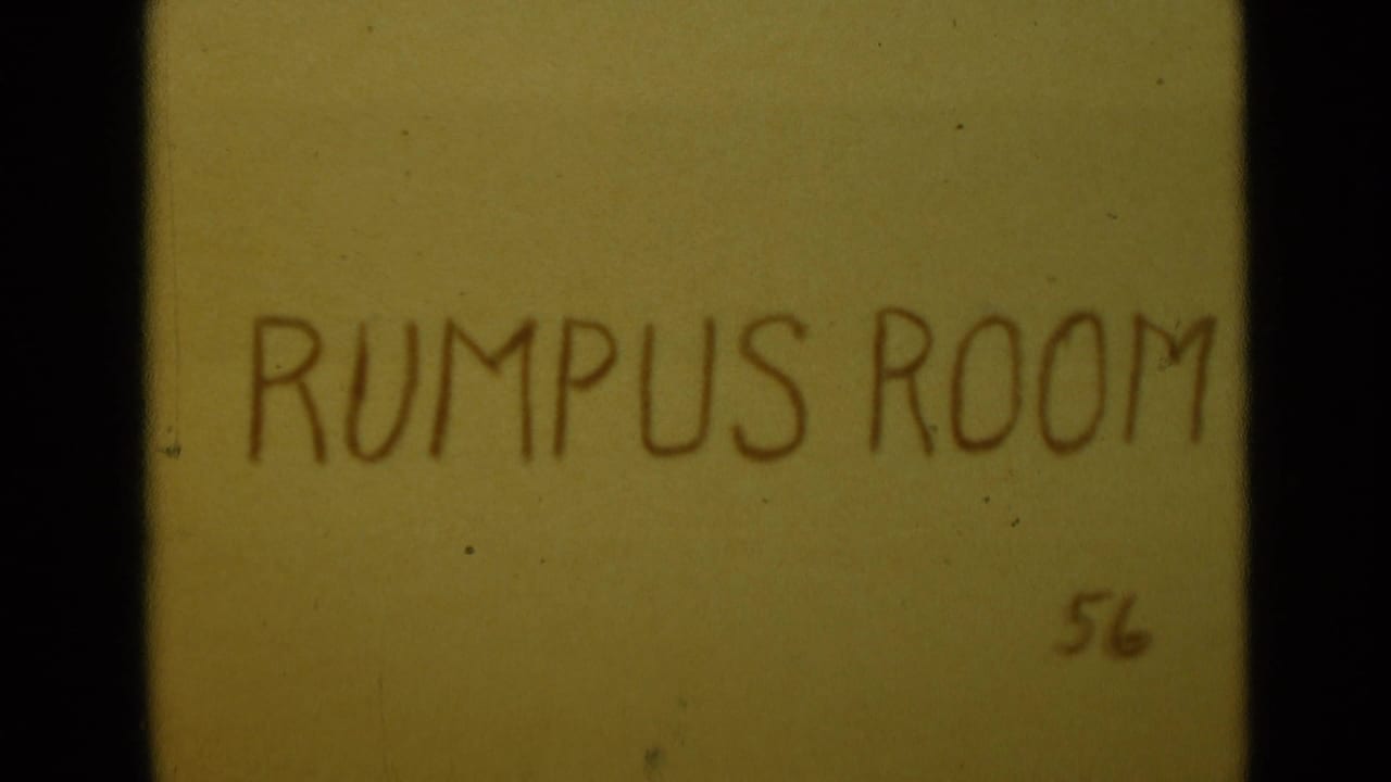 Handwritten title card reading RUMPUS ROOM 56 on yellowed film.