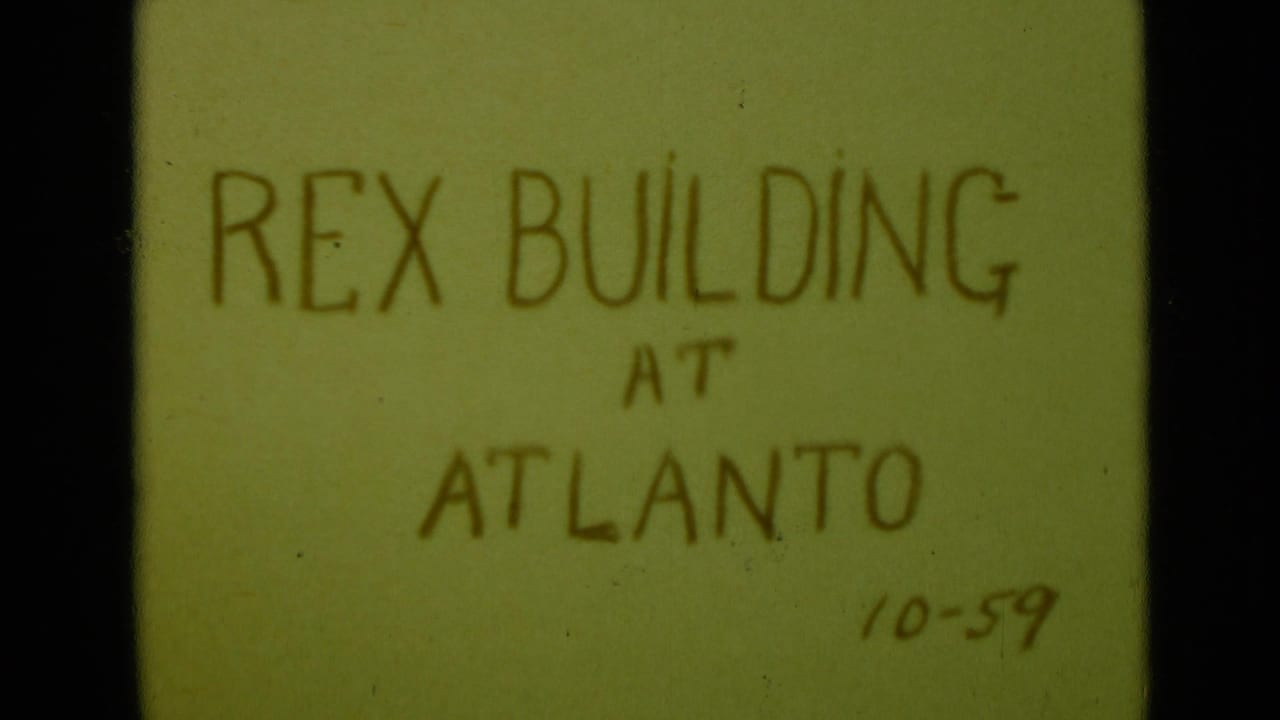 A steadier 8mm title-card frame shows the handwritten words Rex Building at Atlanto, with the date 10-59 near the lower right.
