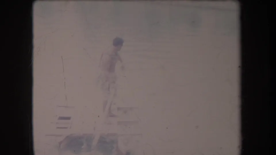 The final frame shows the man near the platform edge, partly turned, with the pole angled down and the riverbank softly visible behind him.