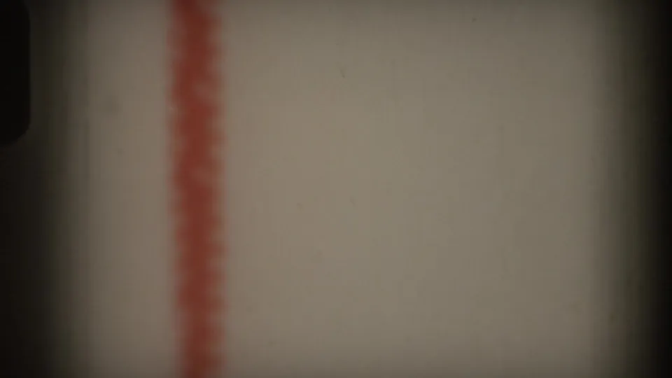 1969 Hawaii 8mm frame with a red vertical stripe, dark central edge, pale surface, and soft home-movie scan texture.