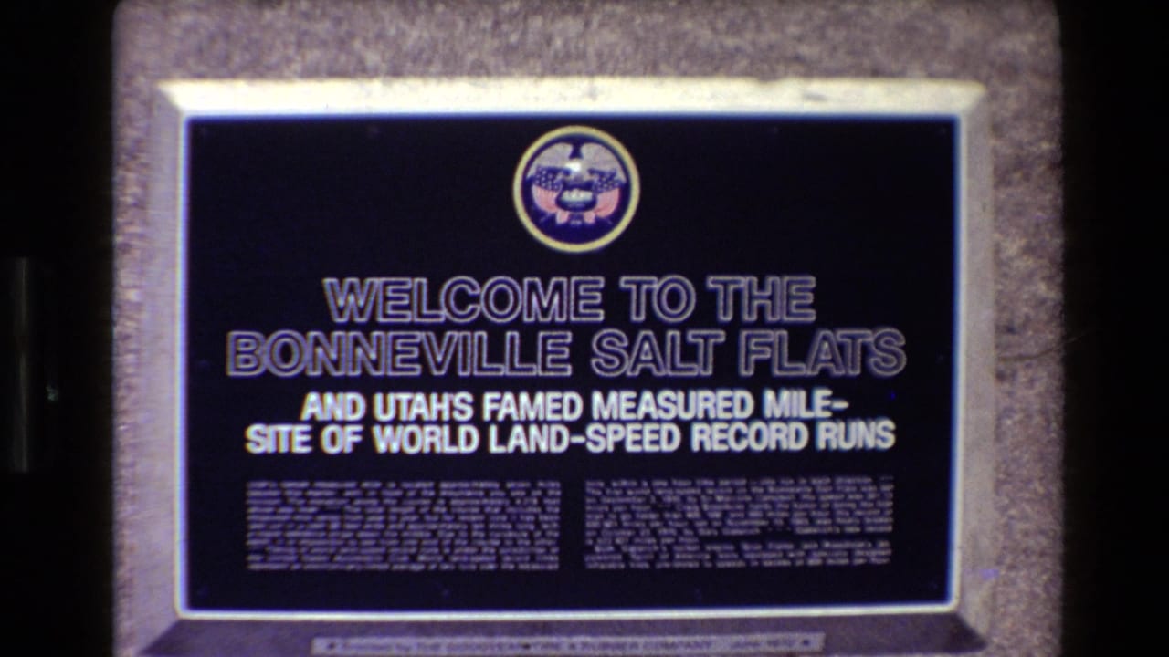 Centered Bonneville Salt Flats sign with white text and circular emblem.