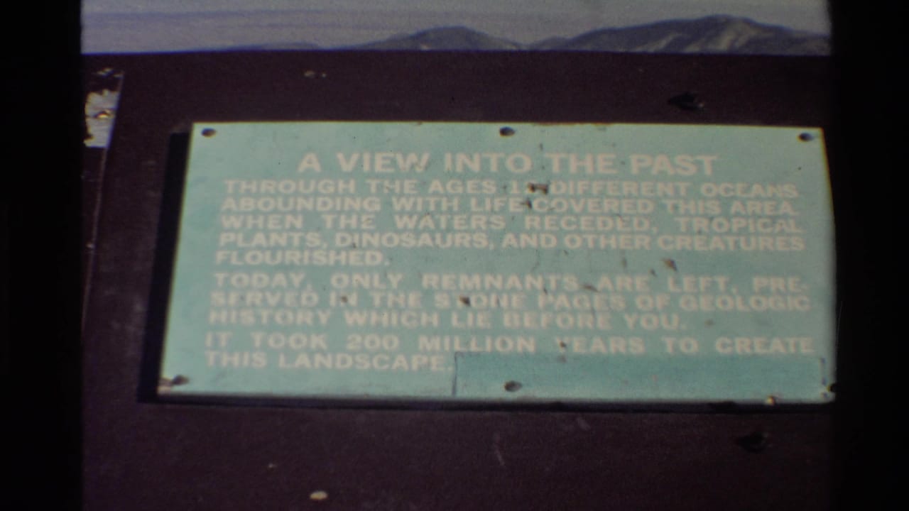 Final 8mm frame holds on the Western USA interpretive plaque about geologic time and the formation of the landscape.