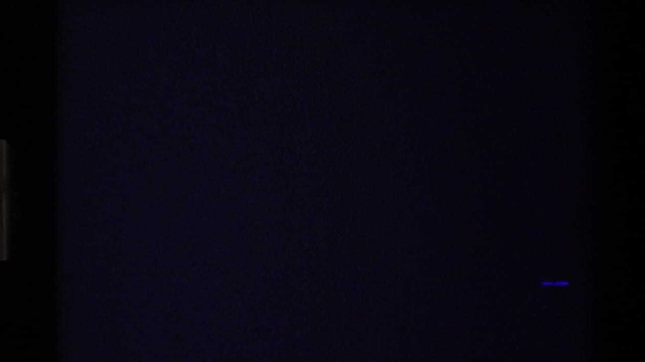End frame appears mostly dark, with little visible landscape detail and a small blue streak near the lower right.