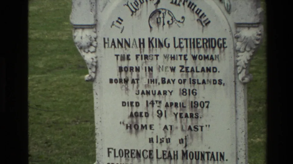 Close 8mm view of the Hannah King Letheridge gravestone, with birth and death details visible on the weathered marker.