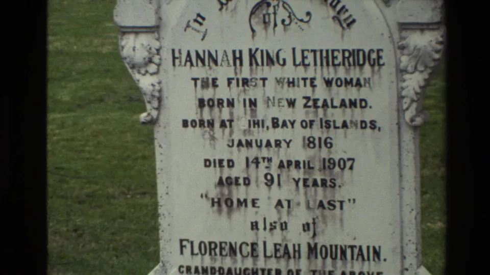 Visitor-shot 8mm frame of the Hannah King Letheridge memorial, including lower text naming Florence Leah Mountain.