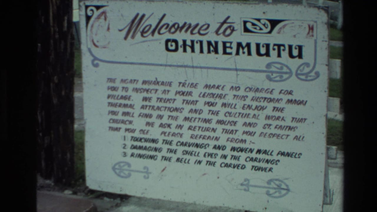 Welcome to Ohinemutu sign with visitor guidance text outdoors.