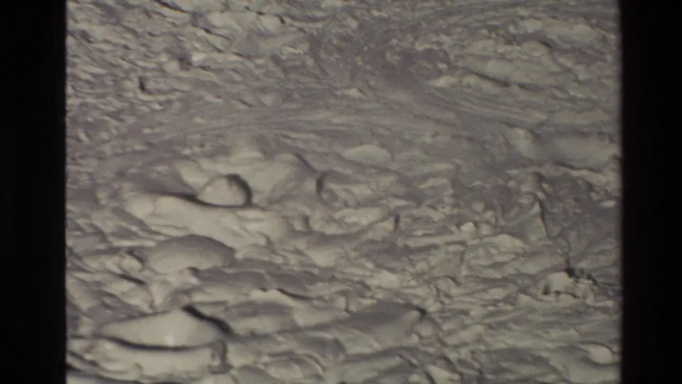 1981 New Zealand 8mm frame showing a close view of textured geothermal mud with soft focus and visible film borders.