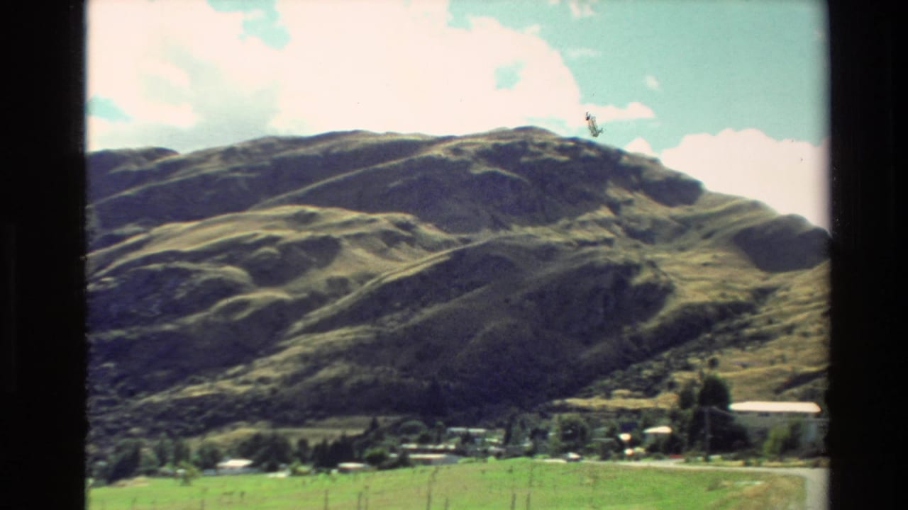 Mountain ridge and valley fields seen through a moving 8mm frame.