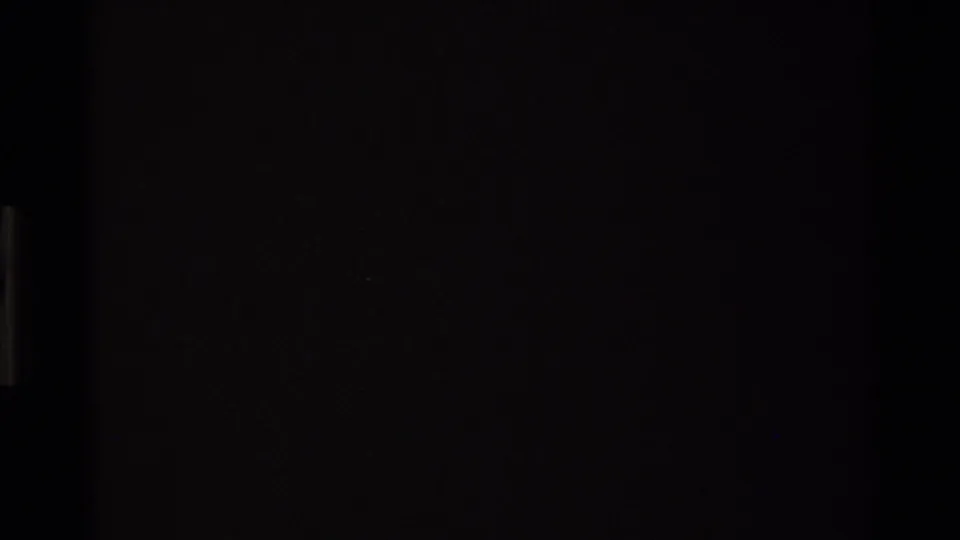 Black end-of-reel frame from a 1980s Super 8 home movie of the California coast — no image content visible.