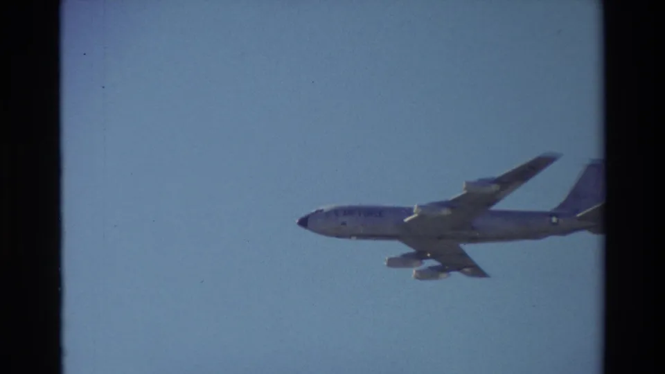 Side profile of the KC-135-type tanker in 1981 Beale AFB home-movie footage, with fuselage markings faintly visible.