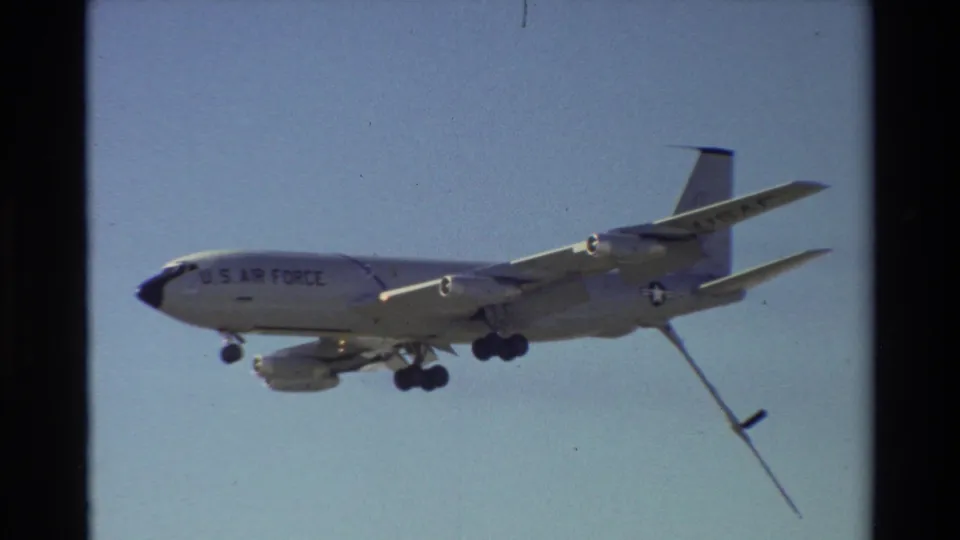 Side view of a U.S. Air Force tanker in 1981 Beale AFB footage, with aircraft markings visible and the refueling boom lowered.