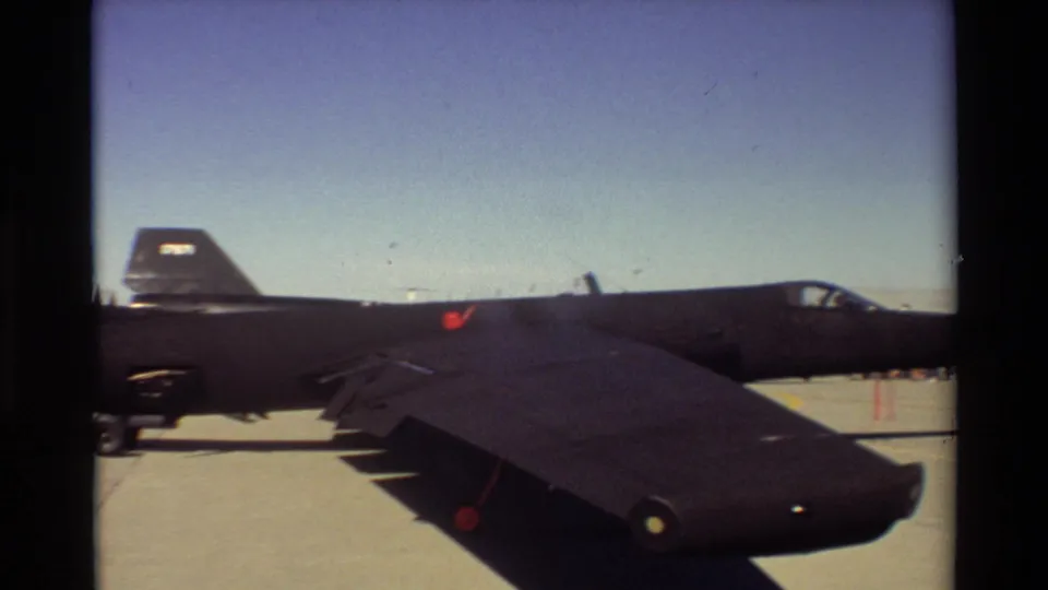 1981 Beale AFB frame showing a long side angle of the SR-71 Blackbird with its wing dominating the foreground.