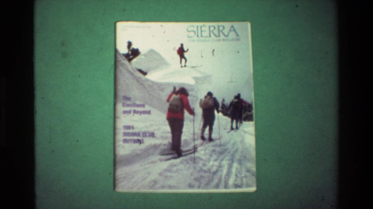 The Sierra cover stays in view, showing the winter recreation artwork and printed outings text on a green surface.