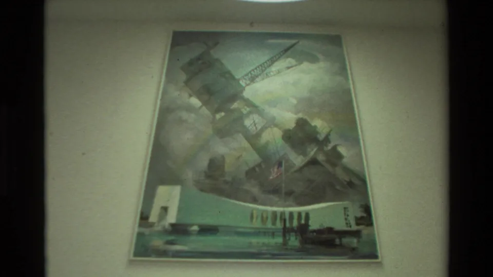 Large painted scene of a damaged battleship, American flag, and rainbow displayed on a wall at the memorial in Hawaii.