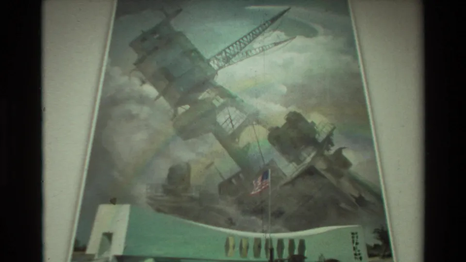 Final frame holds on the Hawaii memorial painting of a damaged battleship, with an American flag and rainbow visible.