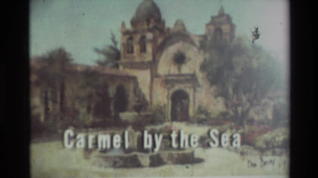 Mission-style building artwork with Carmel by the Sea text across the lower frame.