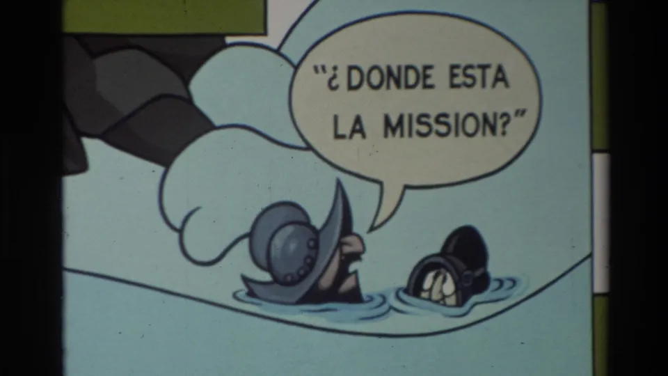 Carmel 1982 8mm frame showing two hand-drawn figures in water with a Spanish speech balloon asking, "¿Donde esta la mission?"