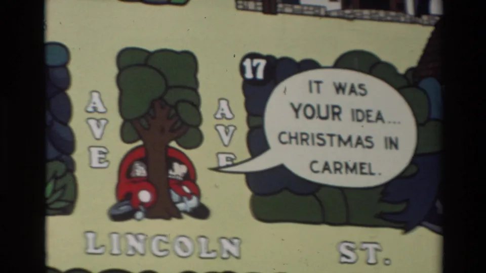 1982 Carmel cartoon frame with Lincoln St. lettering, a red car partly behind a tree, and a speech bubble referring to Christmas in Carmel.