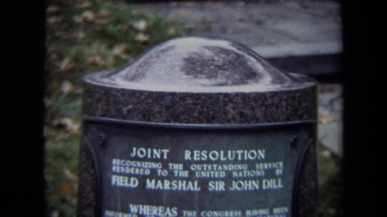 Close view of a dark commemorative plaque naming Field Marshal Sir John Dill.