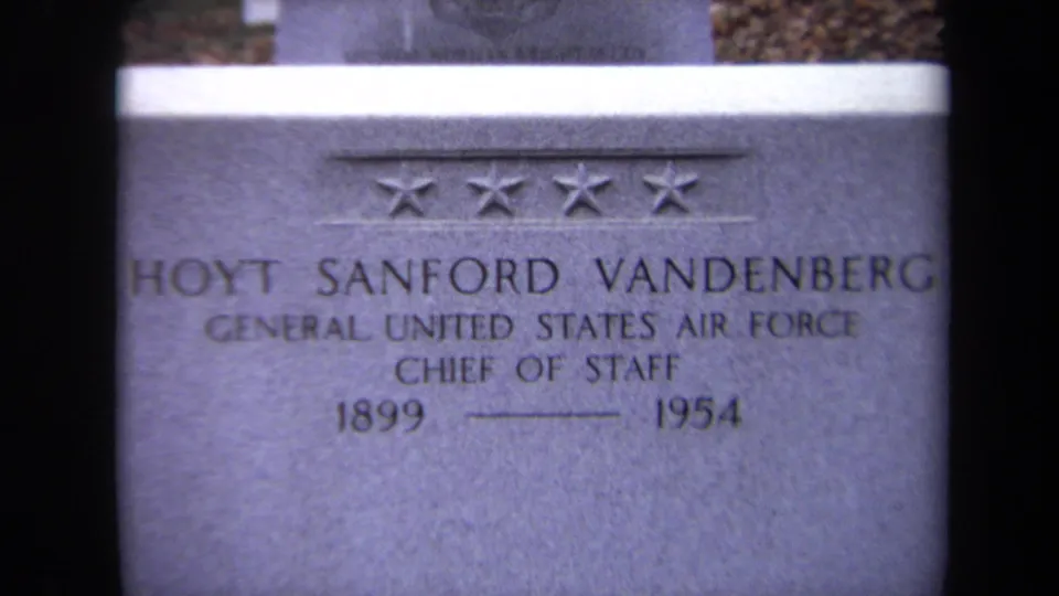 1970 Washington, DC 8mm frame showing the Hoyt Sanford Vandenberg grave marker with Air Force title and 1899-1954 dates.