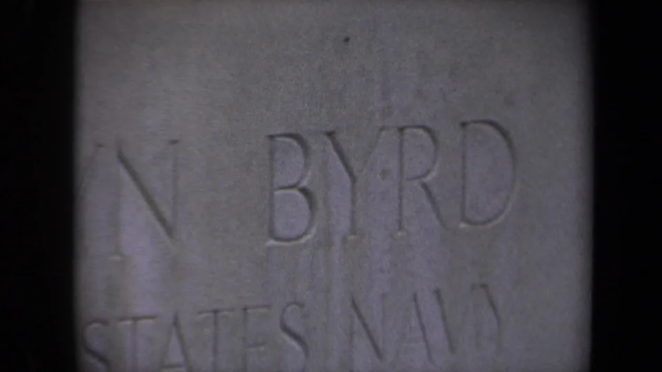 Final 1970 Washington, DC frame holding on the Byrd gravestone inscription, with large letters softened by grain and shadow.