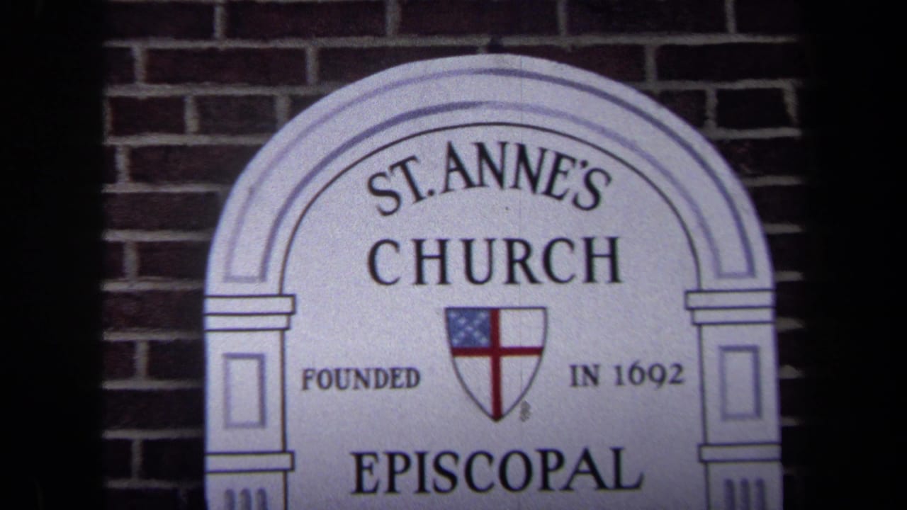 1970 Washington, DC close-up of the arched St. Anne's Church Episcopal sign mounted on brick.