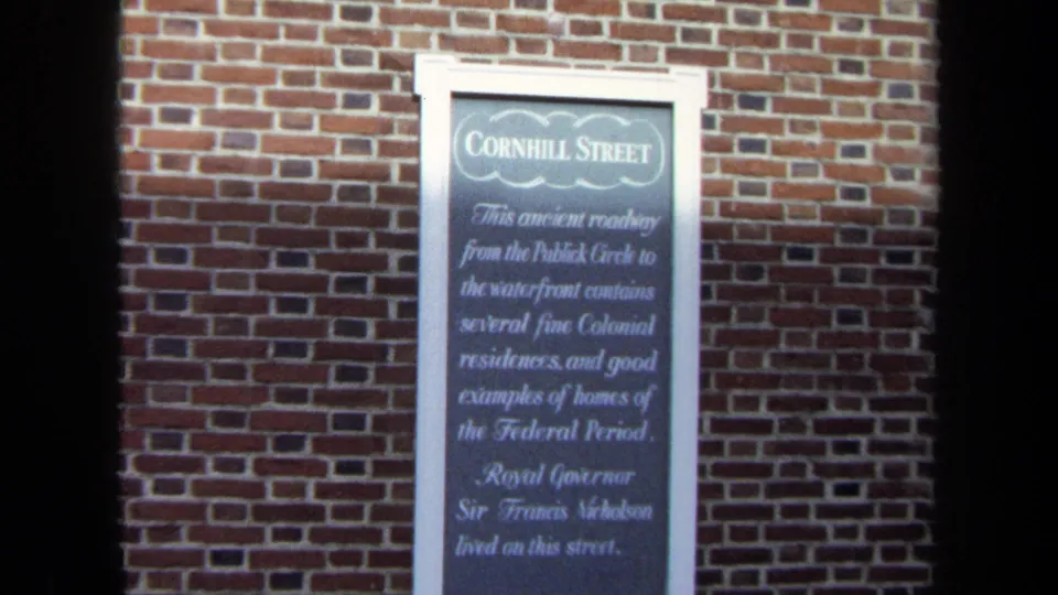 Close 1970 Washington, DC frame of the Cornhill Street marker with text about colonial and Federal-period homes.