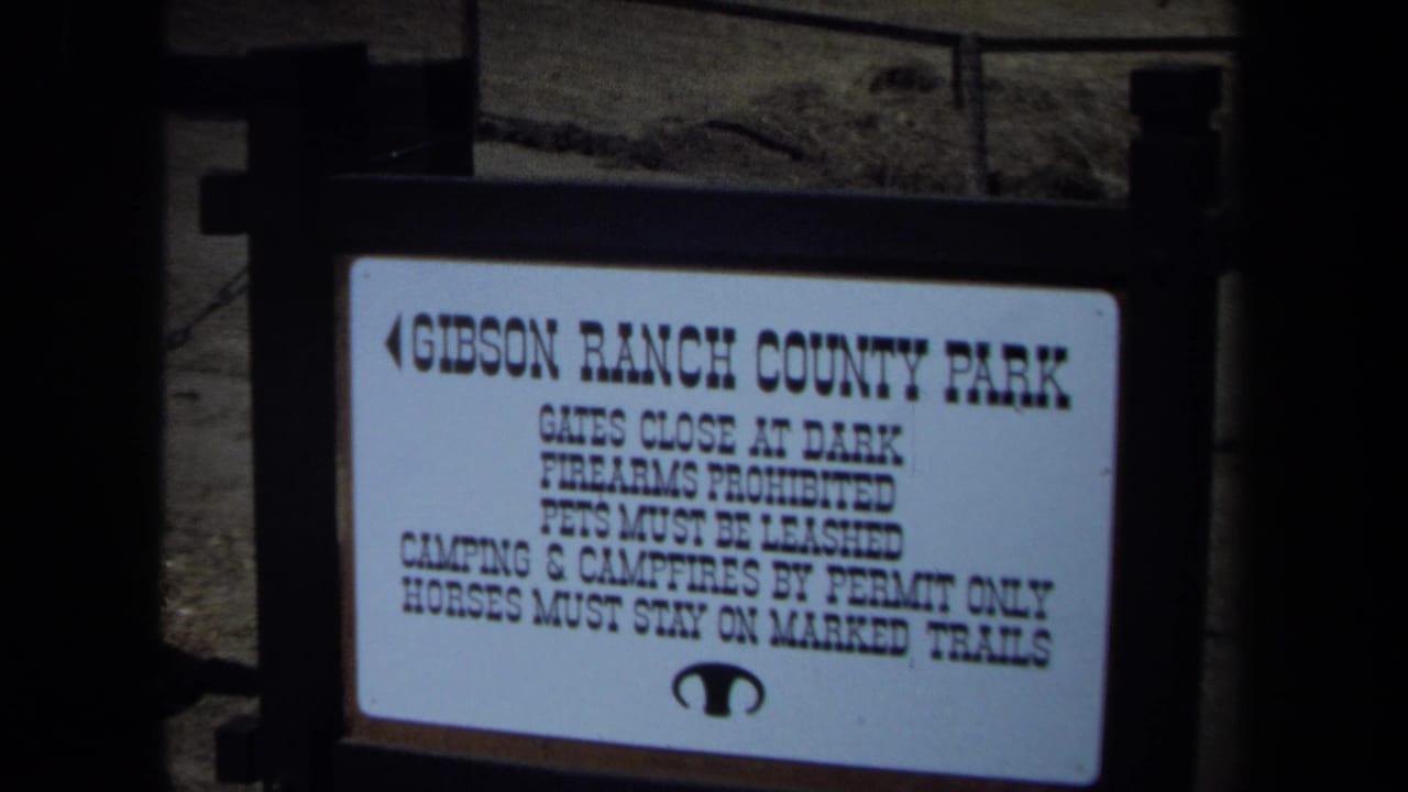 Gibson Ranch County Park sign with posted rules in a similar view.