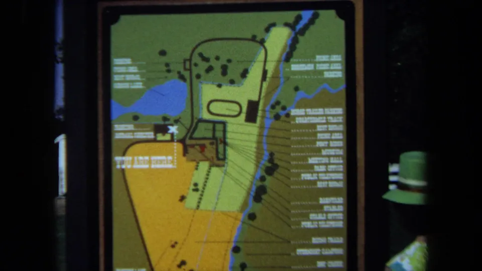 1971 California 8mm frame showing a colorful park map sign with trails, water features, labels, and a YOU ARE HERE marker.