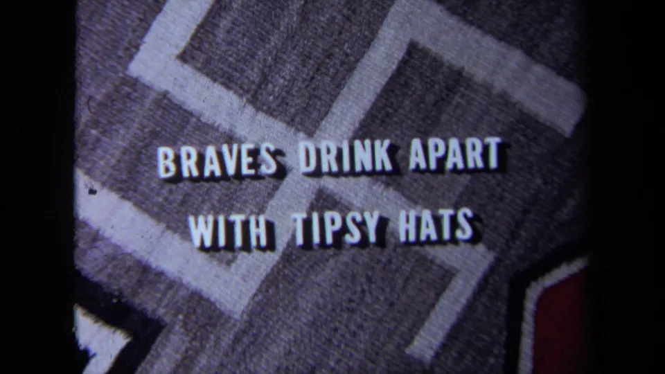 Another 1971 title-card frame shows the phrase “BRAVES DRINK APART WITH TIPSY HATS” against textured patterned fabric.