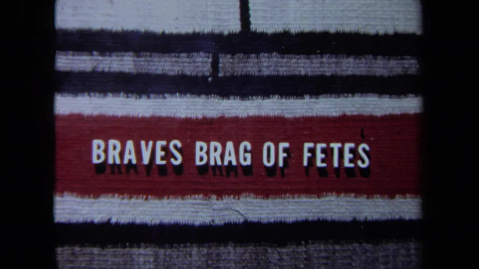 1971 California 8mm frame showing a second television-style title attempt with BRAVES BRAG OF FETES.