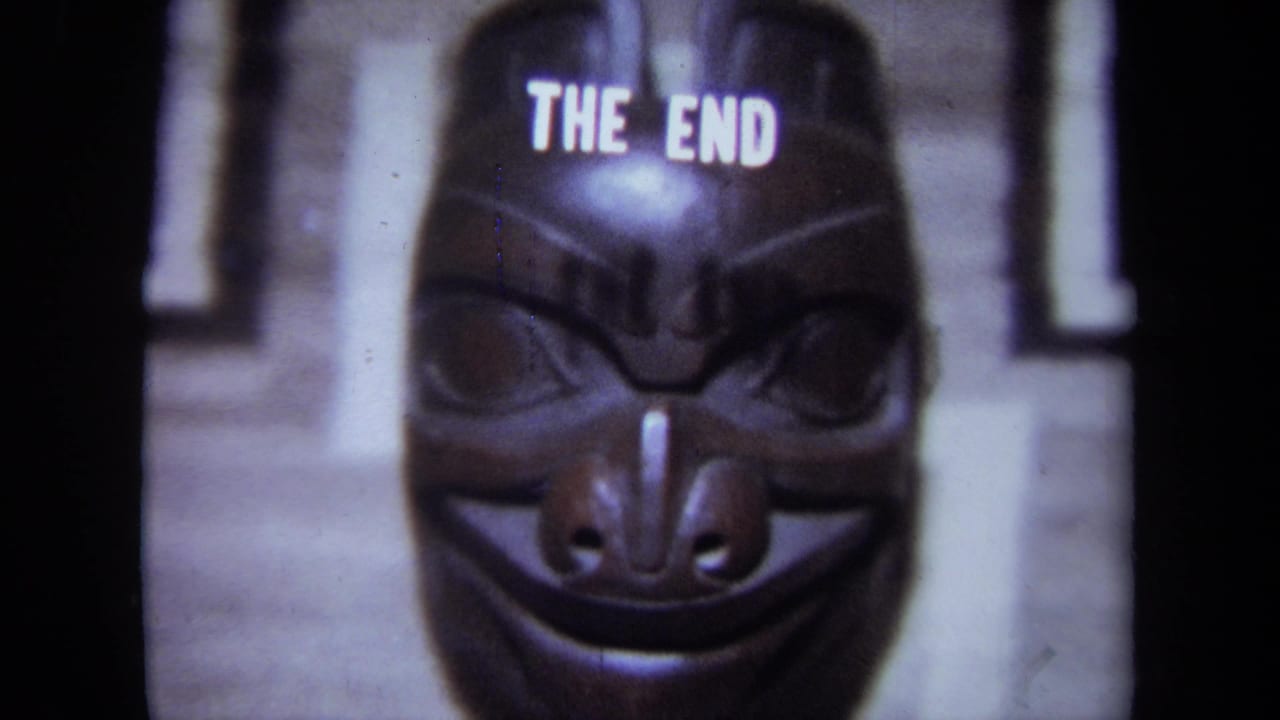1971 California 8mm frame with a carved mask centered below the THE END ending title.