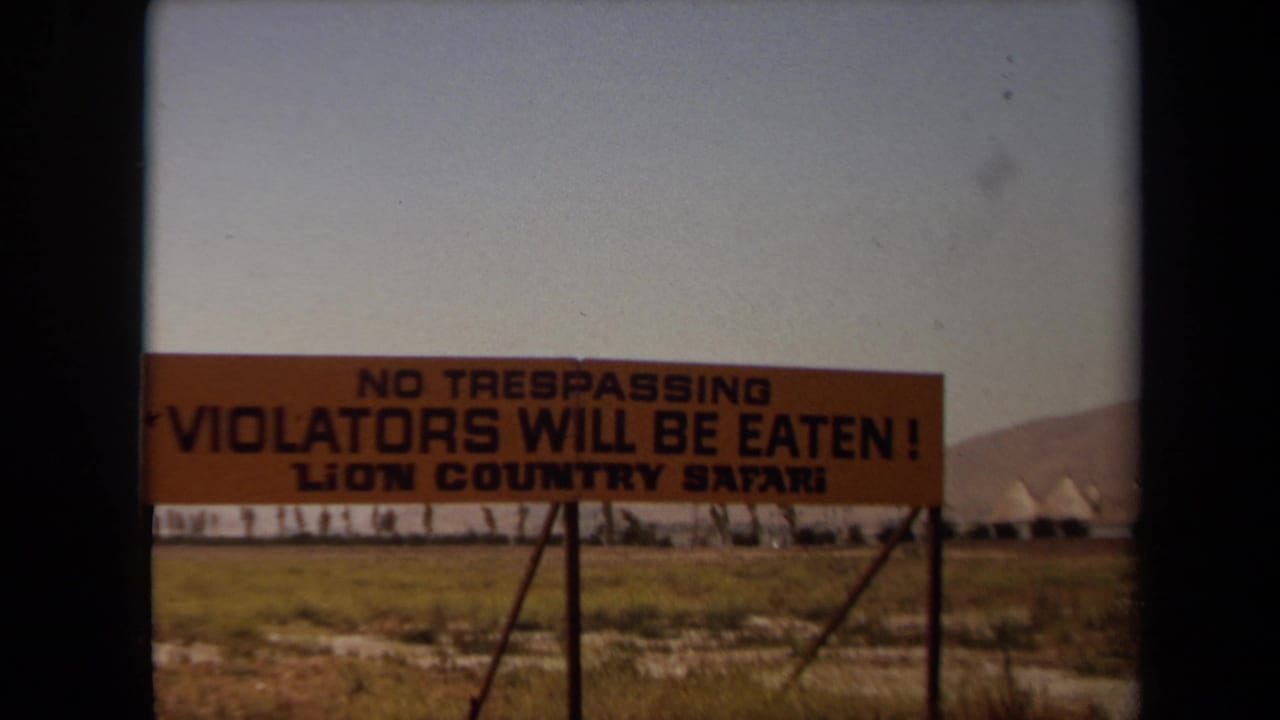 1971 Laguna Hills footage showing an orange Lion Country Safari warning sign reading that trespassers will be eaten.