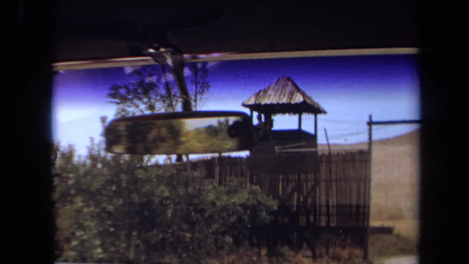 The final frame shows a vehicle interior edge and mirror passing a fenced wildlife-park structure in Laguna Hills, California, in 1971.