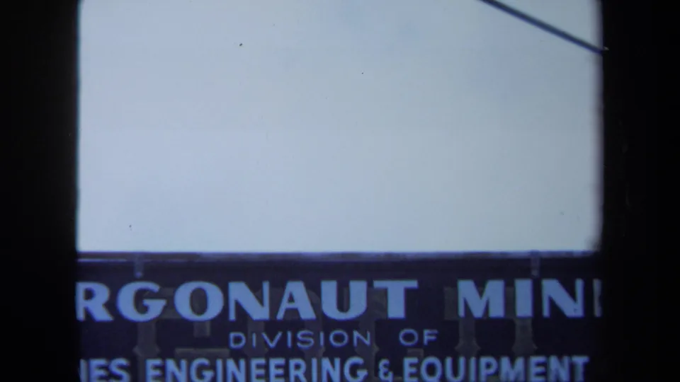 1971 Maine 8mm frame showing the lower portion of the Argonaut Mine sign, with division and engineering lettering partly cropped.