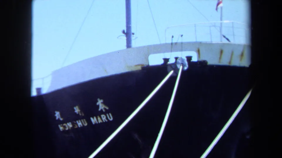 A closer 1971 Maine view shows the KONSHU MARU hull lettering below a white deck edge with diagonal mooring lines crossing the frame.