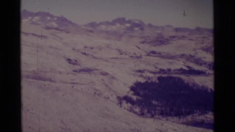 A wide 8mm view shows rugged alpine ridges and darker vegetation below, likely within the supplied Minaret Wilderness location.