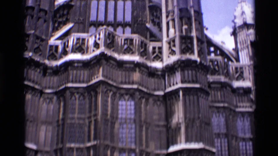 Close 1969 London view of Gothic cathedral windows, buttress-like forms, carved trim, and layered exterior stone details.