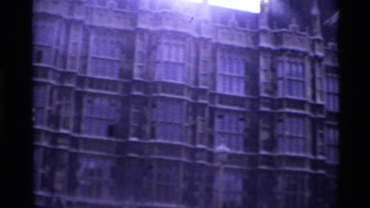 1969 London exterior view of ornate church stonework, with repeated Gothic windows and a handheld tilted composition.