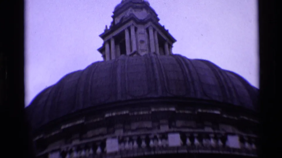 1969 London 8mm frame showing the upper dome and lantern of St Paul's Cathedral from a low visitor viewpoint.