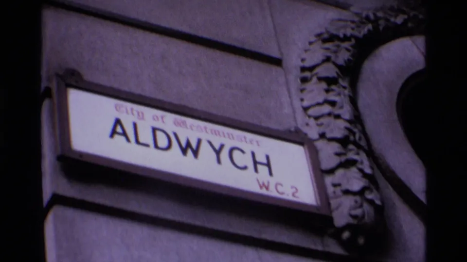 A clearer 1969 London view of the Aldwych W.C.2 street sign mounted on a stone facade in Westminster.