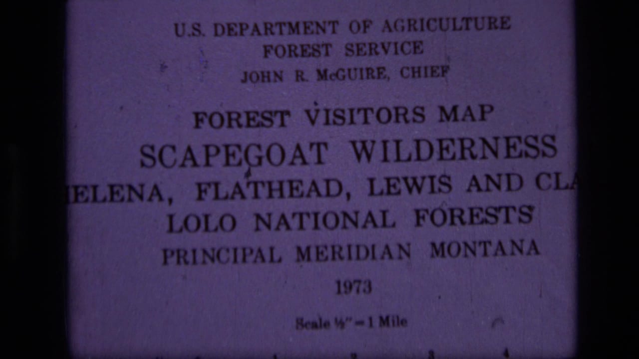 1973 USDA Forest Service visitor map title page for Scapegoat Wilderness in Montana, filmed close up on 8mm.