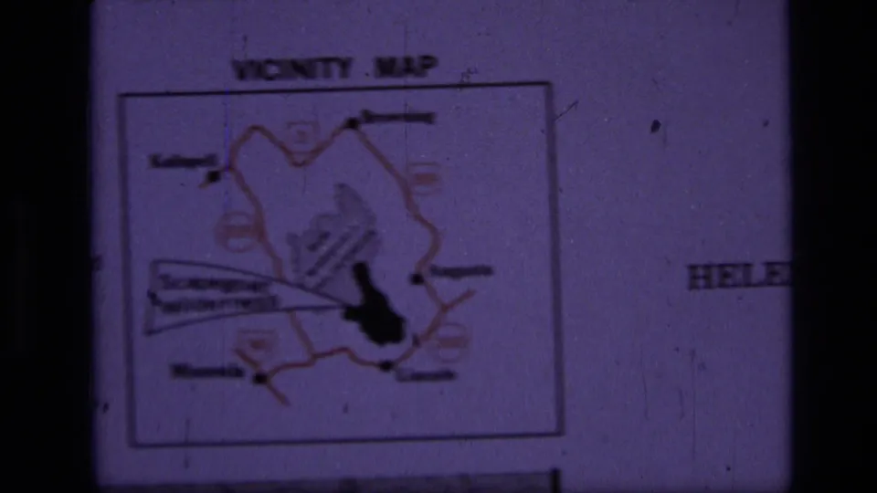 8mm frame of a Scapegoat Wilderness vicinity map panel, with regional outline, town labels, and adjacent Helena text.