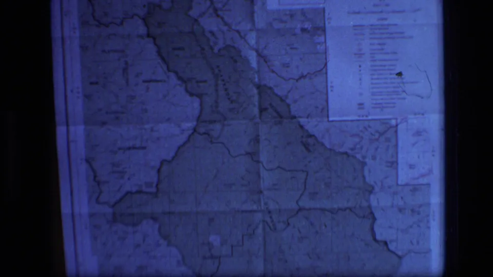 Blue-tinted 8mm view of a Scapegoat Wilderness map, showing regional boundaries, river-like markings, and a right-side legend panel.
